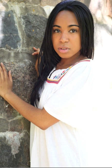 Glamorous ebony teen Tahela loses her white dress & shows her curvaceous body