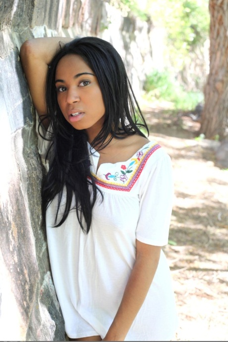 Glamorous ebony teen Tahela loses her white dress & shows her curvaceous body