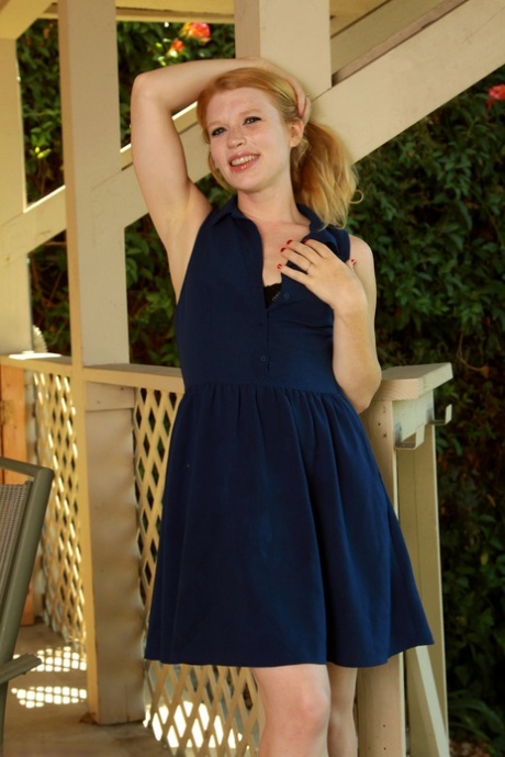 Lusty ginger MILF Madison Young strips & shows off her pink holes on the porch