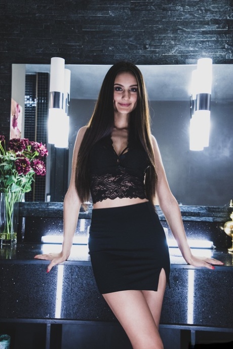 Skinny teen pornstar Eliza Ibarra exposes her boobs and rubs her hairy muff