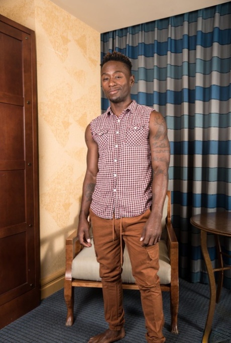 Stunning black dude Miller Axton reveals his huge boner and poses on a chair