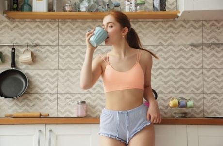 Beautiful redhead Jia Lissa shows off her big ass & fingers her yummy pussy