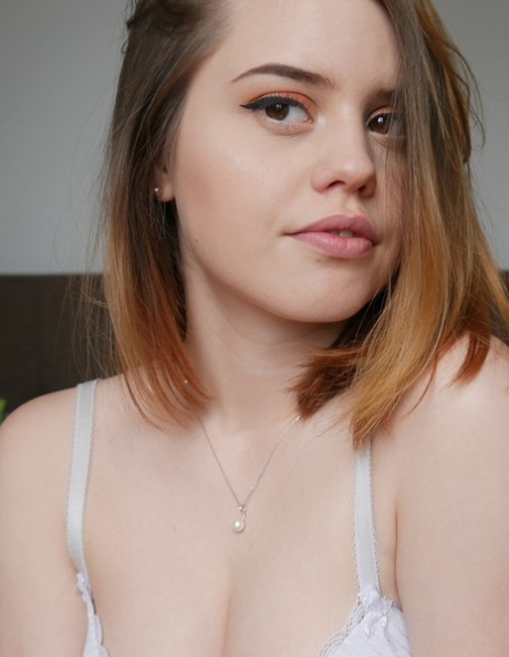 Lovely teen Jamie Young shows off her big booty & her shaved pussy on her bed