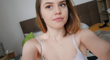Lovely teen Jamie Young shows off her big booty & her shaved pussy on her bed