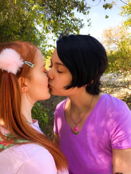 Teens Cherry Fae Krystal & Orchid French kiss & rub each other's tits outside