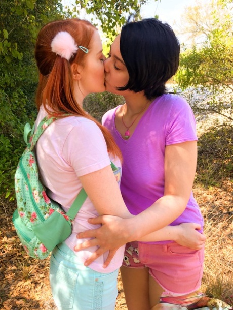 Teens Cherry Fae Krystal & Orchid French kiss & rub each other's tits outside