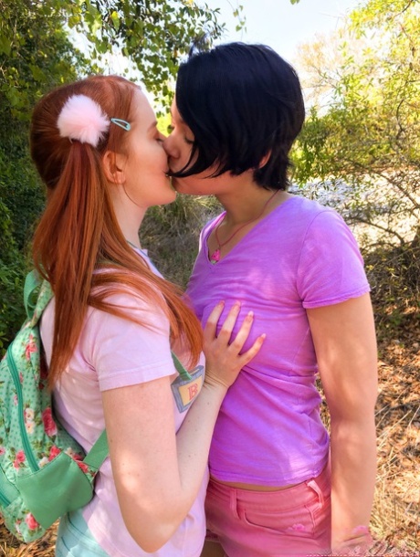 Teens Cherry Fae Krystal & Orchid French kiss & rub each other's tits outside