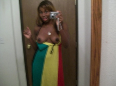 Ebony teen Tristina Brown takes selfies of her juicy tits & chocolate holes