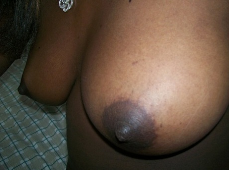 Ebony teen Tristina Brown takes selfies of her juicy tits & chocolate holes