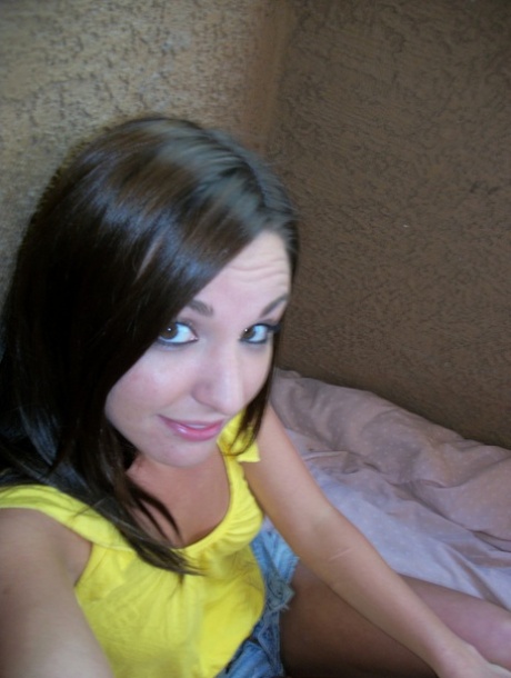 Cute brunette teen shows off her lovely tits and her perfect booty