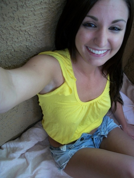 Cute brunette teen shows off her lovely tits and her perfect booty