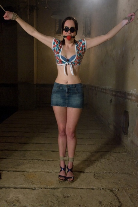 Cute teen Winter Sky gets stripped and whipped while tied up in a basement