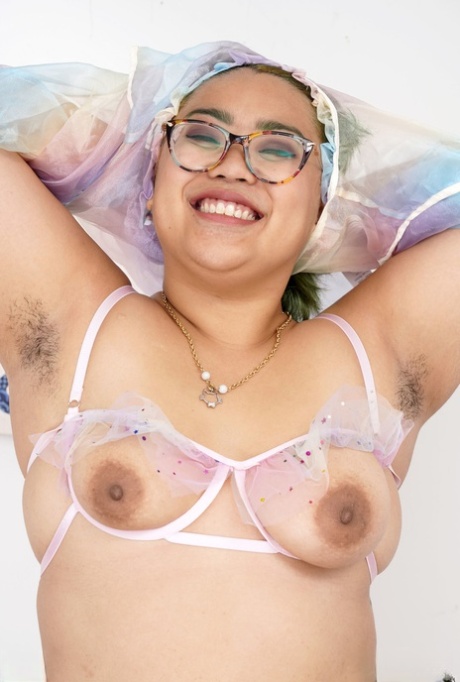 Curvy Manila Bey spreads her hairy pussy while showing off her chubby body