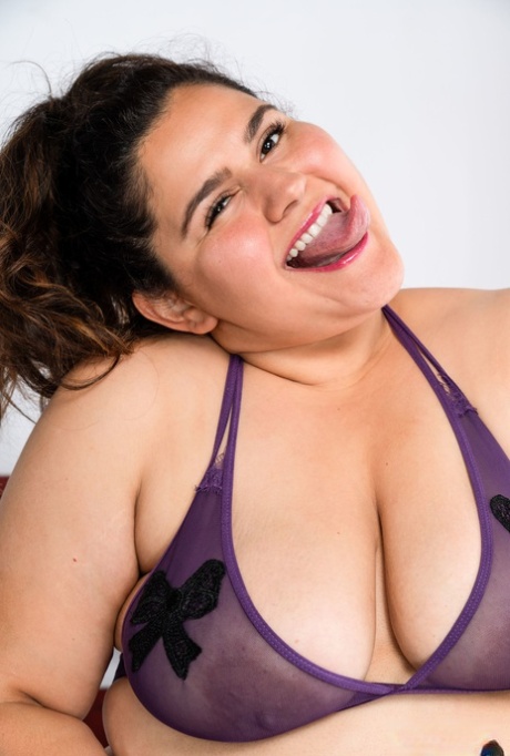 Fat brunette American Karla Lane unleashes her big tits & masturbates