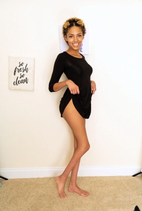 Black amateur girl Rebel exposes her slim body and hairy pussy in a solo