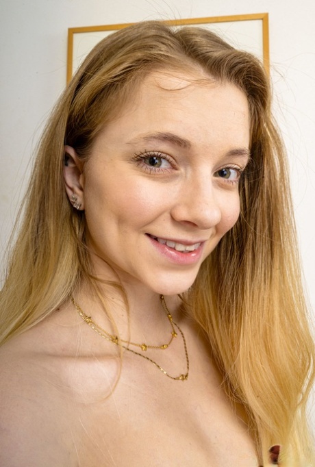 Slim teen Riley Star lifts her dress up and spreads her tasty swollen twat