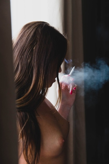 Spanish teen Nata Lee masturbates in her stockings after smoking a cigarette