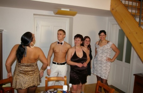 Four amateur cougars in hot stockings fucking young blond dude together