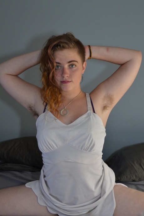 Curly haired amateur Moth unveils her beautiful breasts & her hairy pussy