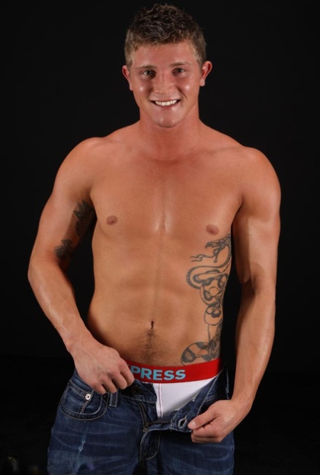 Muscular gay guy Sinclair flaunts his strong naked body & his hard dick