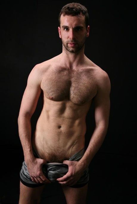 Sweet gay Riley slowly loses his clothes and fondles his rock hard dick