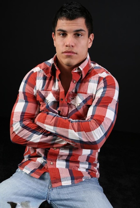 Gay Latino Angelo reveals his muscular body and strokes his rock-hard dick