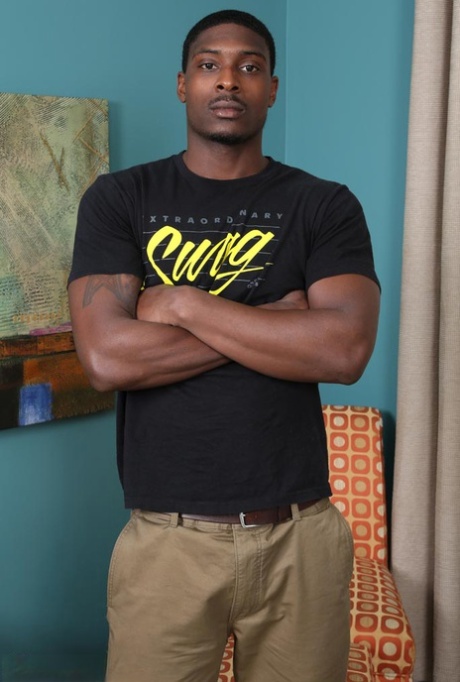 Gay black bodybuilder Rupert shows his round ass, muscles and big dick