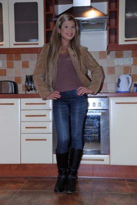 Skinny European babe Tiffany F teases with her hot body while stripping