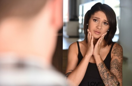 Inked beauty Katelynn James surprises her stepbro & gives him a footjob