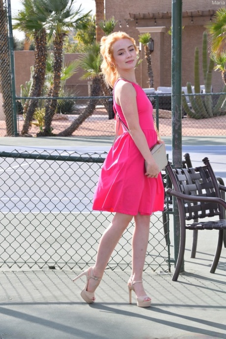 Pantyless babe in a pink dress Maria dildos and fists her hot pussy