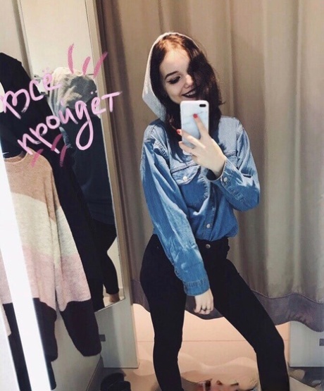 Beautiful amateur takes hot nude selfies while trying out her sexy outfits