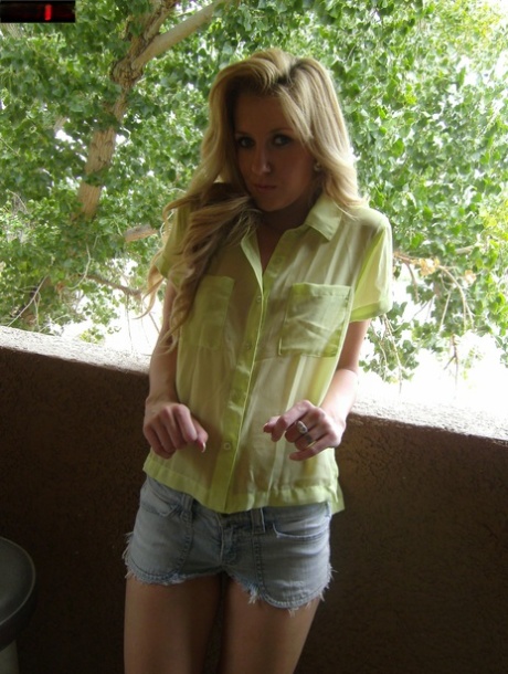 Petite blonde WouJ shows off her sexy legs and her hot ass in booty shorts