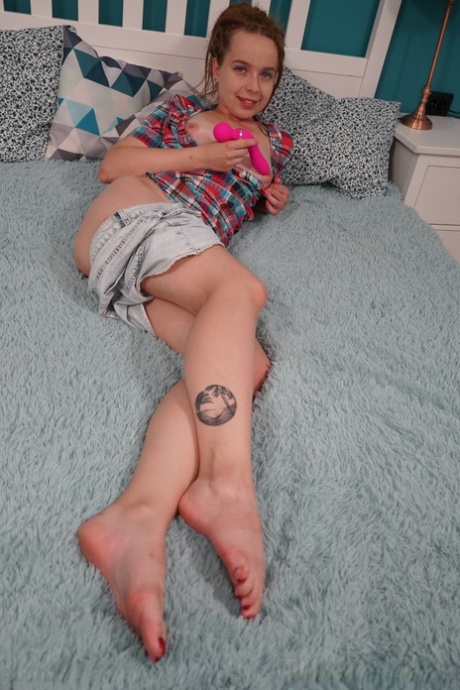 Little babe Luna Haze gets rid of her jean shorts and masturbates with a toy