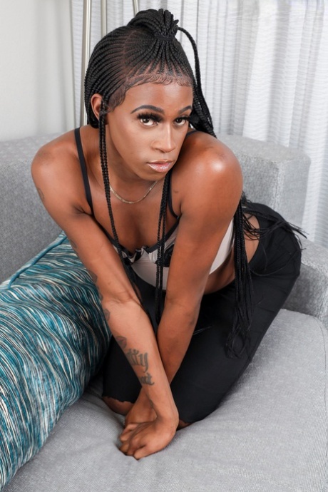 Naughty ebony shemale Lola Bunniie strips & reveals her big ass & BBC