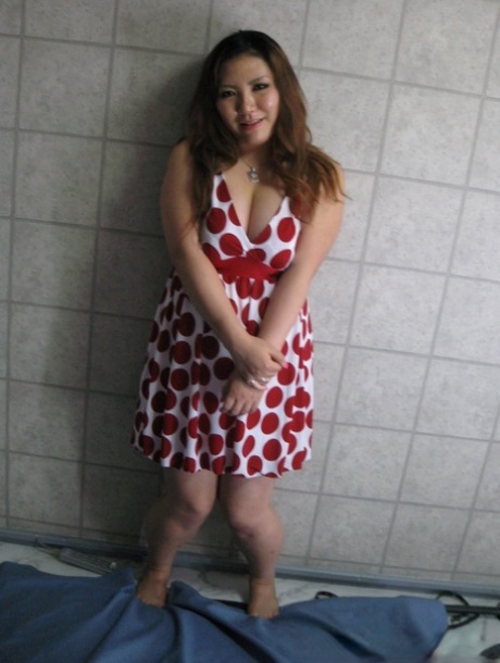 Chubby Asian exposes her huge juggs and massive ass in amateur action