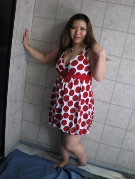Chubby Asian exposes her huge juggs and massive ass in amateur action
