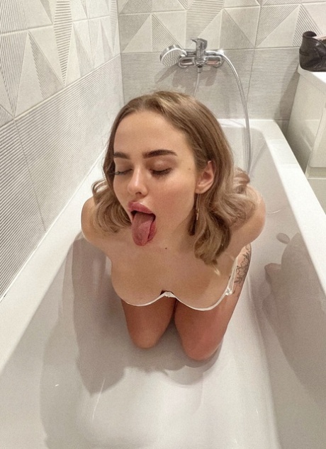 Naughty babe Katrinka teasing with her incredible big ass and boobs