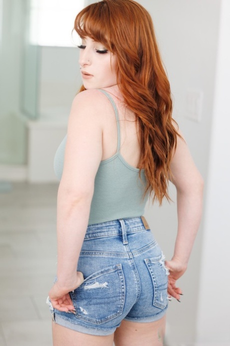 Beautiful ginger Alice Marie unveils her curves before sucking & fucking a rod