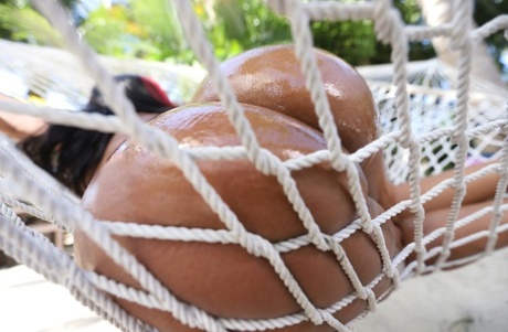 Redheaded ebony Jordyn Falls flaunts her big ass & tits before an outdoor bang