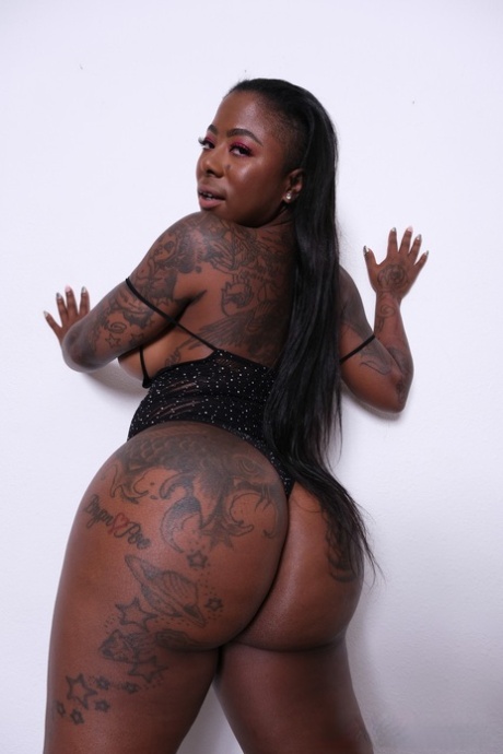 MILF Misty Stone poses while inked ebony Cher Adele gets fucked doggystyle