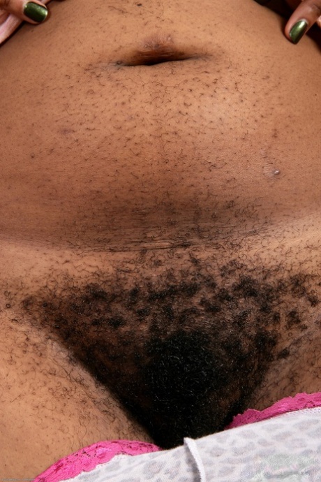 Stacked black babe Misty shows off her big tits & spreads her hairy pussy