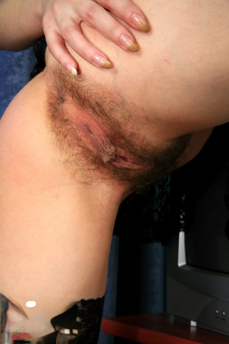 Slutty amateur Orina strips to her stockings & shows her hairy holes