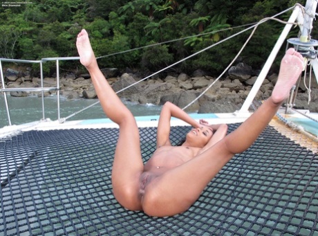 Ebony stunner Skin Diamond strips on a yacht & shows her big ass & hot muff