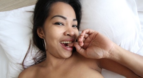 Sexy Asian babe Juliet poses naked and spreads her legs for a POV fuck