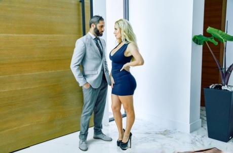 Curvy blonde goddess Savannah Bond gets banged on the couch & takes a cumshot