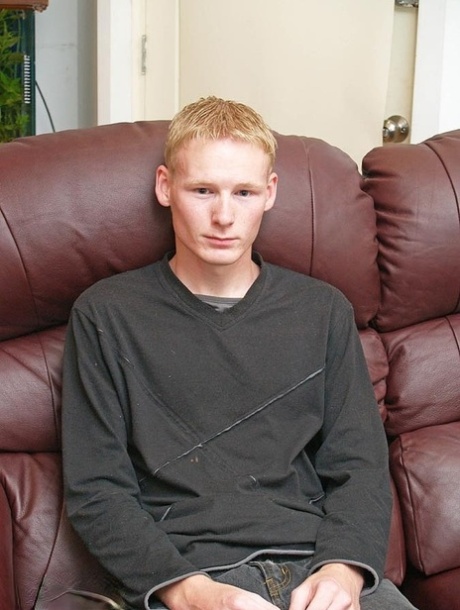 Hot twink strips & jerks his small dick until he ejaculates on the couch