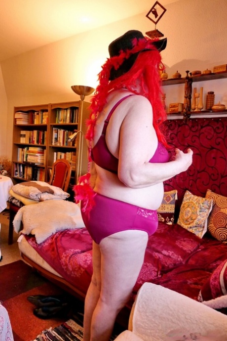 Naughty granny Prolet shows off her saggy tits while undressing