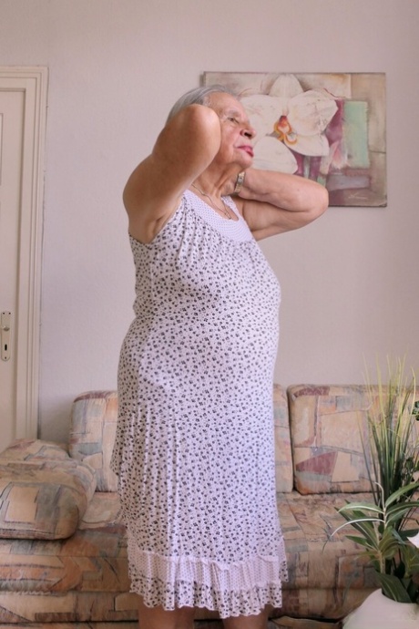 Chubby granny Carlotta shows her saggy tits in a kinky undressing compilation