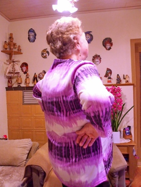 Kinky fat granny Pulcheria poses naked in a solo home striptease