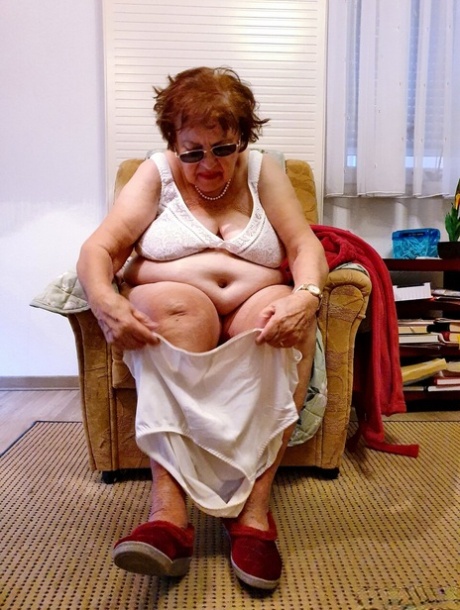 Fat old granny in sunglasses Petljura shows off her body and big tits